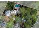 Aerial view of the property including a swimming pool and outdoor lounge area at 9995 Huntcliff Trce, Atlanta, GA 30350