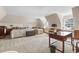 Large bedroom with beds, wooden desk and window seat at 9995 Huntcliff Trce, Atlanta, GA 30350