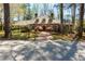 Beautiful brick home with a charming brick walkway and well-manicured lawn at 9995 Huntcliff Trce, Atlanta, GA 30350