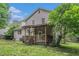 Backyard featuring a patio and deck at 1888 Kelvin Dr, Lawrenceville, GA 30043