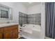 Bathroom featuring a large tub with decorative tile, sink and shower at 1888 Kelvin Dr, Lawrenceville, GA 30043