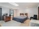 Comfortable bedroom featuring a skylight, ample space, and a cozy atmosphere for relaxation at 1888 Kelvin Dr, Lawrenceville, GA 30043