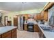 Functional kitchen featuring modern appliances, a convenient island, and a well-lit work space at 1888 Kelvin Dr, Lawrenceville, GA 30043