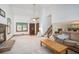 Spacious living room featuring a cozy fireplace, high ceilings, and an abundance of natural light at 1888 Kelvin Dr, Lawrenceville, GA 30043