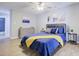 Inviting bedroom with a comfortable bed, side tables and drawers at 24317 Plantation Ne Dr, Atlanta, GA 30324