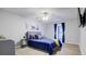 Cozy bedroom featuring a comfortable bed, stylish decor, and natural light at 24317 Plantation Ne Dr, Atlanta, GA 30324