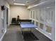 A game room with a ping pong table, seating, and light carpet at 24317 Plantation Ne Dr, Atlanta, GA 30324