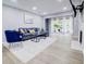 Inviting living room with a comfortable couch, modern accents, fireplace, and ample natural light at 24317 Plantation Ne Dr, Atlanta, GA 30324