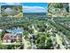 A beautiful community with a lake, clubhouse with tennis courts and pool, and homes surrounded by mature trees at 3517 Ridgemill Cir, Dacula, GA 30019