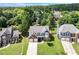 This property is located in a neighborhood surrounded by mature trees and well-manicured lawns and landscaping at 3517 Ridgemill Cir, Dacula, GA 30019