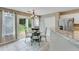 Bright dining area with sliding door access and granite counters, ideal for casual meals at 3517 Ridgemill Cir, Dacula, GA 30019