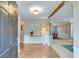 Inviting foyer with hardwood floors, neutral paint, and an open floor plan at 3517 Ridgemill Cir, Dacula, GA 30019