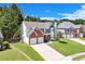 Beautiful home with a two-car garage and well-maintained lawn in a suburban neighborhood with mature trees at 3517 Ridgemill Cir, Dacula, GA 30019