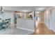 Well-lit kitchen with stainless steel appliances and an adjacent dining area at 3517 Ridgemill Cir, Dacula, GA 30019