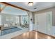 Inviting living room with an adjacent office space and plenty of natural light at 3517 Ridgemill Cir, Dacula, GA 30019