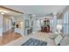 Open-concept living and dining area featuring neutral decor and ample space for entertaining at 3517 Ridgemill Cir, Dacula, GA 30019