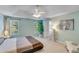 Serene main bedroom with tray ceiling and lots of natural light at 3517 Ridgemill Cir, Dacula, GA 30019