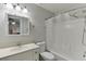 Bathroom featuring a shower and tub combo and white vanity at 376 Paula Ct, Lawrenceville, GA 30046