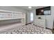 Bedroom with bunk bed, queen size bed, flatscreen TV, and wood flooring at 376 Paula Ct, Lawrenceville, GA 30046