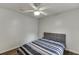 Bedroom featuring a ceiling fan and hardwood floors at 376 Paula Ct, Lawrenceville, GA 30046