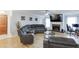 Open living room with ample seating, fireplace, hardwood floors, and abundant natural light at 376 Paula Ct, Lawrenceville, GA 30046