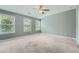Spacious bedroom with three large windows offering ample natural light at 3807 Cyrus Ridge Nw Way, Kennesaw, GA 30152