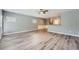 Open-concept living room with updated flooring, contemporary design, and ample natural light at 3807 Cyrus Ridge Nw Way, Kennesaw, GA 30152