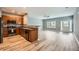 Open floor plan with modern kitchen, stainless steel appliances, and spacious living area at 3807 Cyrus Ridge Nw Way, Kennesaw, GA 30152