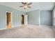 Spacious main bedroom with ceiling fan, ensuite bath and walk-in closet at 3807 Cyrus Ridge Nw Way, Kennesaw, GA 30152
