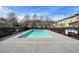 Community pool and pool rules with townhomes and trees in the background at 3807 Cyrus Ridge Nw Way, Kennesaw, GA 30152