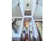 Elegant foyer boasting a staircase with iron spindles, hardwood floors, and an open view to living spaces at 4056 Kingsley Park Ct, Peachtree Corners, GA 30096