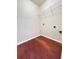 Laundry room with hardwood floors and washer/dryer hookups at 4056 Kingsley Park Ct, Peachtree Corners, GA 30096