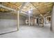 Spacious unfinished basement with concrete floors, high ceilings and natural light at 516 Main St, Hiram, GA 30141