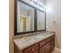 Bathroom with a granite countertop vanity, and modern fixtures, providing a luxurious feel at 516 Main St, Hiram, GA 30141