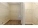 Walk-in closet featuring carpeted floors and multiple levels of wire shelving for optimal storage solutions at 516 Main St, Hiram, GA 30141