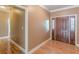 Entryway with hardwood floors leads to the front door at 516 Main St, Hiram, GA 30141