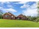 Inviting brick home with a well-manicured lawn and charming curb appeal at 516 Main St, Hiram, GA 30141