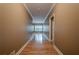 Inviting hallway with hardwood floors leading to a bright living area and rooms at 516 Main St, Hiram, GA 30141