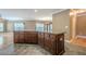 Gourmet kitchen island offers generous counter space and cabinet storage at 516 Main St, Hiram, GA 30141