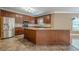 Updated kitchen with expansive island, stainless appliances, and ample cabinet space at 516 Main St, Hiram, GA 30141