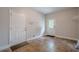 Convenient mud room with tile flooring, ample coat storage, and access to laundry at 516 Main St, Hiram, GA 30141