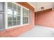 Covered front porch featuring painted wood flooring and a swing at 516 Main St, Hiram, GA 30141