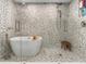 Modern bathroom featuring a glass-enclosed shower, stylish soaking tub, and sophisticated fixtures at 582 Lakeshore Ne Dr, Atlanta, GA 30307