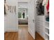 Spacious walk-in closet with custom shelving and storage solutions adjacent to the well-lit bedroom at 582 Lakeshore Ne Dr, Atlanta, GA 30307