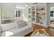 Comfortable living room with hardwood floors, built-in shelves, and natural light at 582 Lakeshore Ne Dr, Atlanta, GA 30307