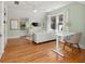 Bright office space featuring a window seat, modern desk and hardwood flooring at 582 Lakeshore Ne Dr, Atlanta, GA 30307