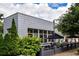 The restaurant has outdoor patio seating with umbrellas and shrubbery, as well as a modern look at 582 Lakeshore Ne Dr, Atlanta, GA 30307
