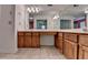 A large bathroom featuring and sinks with a vanity and large mirror at 1464 Yorktown Nw Dr, Lawrenceville, GA 30043