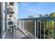 The home's balcony has seating and great views of trees and sky at 3300 Windy Ridge Se Pkwy # 718, Atlanta, GA 30339