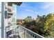 Relax on this condo balcony with views of trees and the outdoors at 3300 Windy Ridge Se Pkwy # 718, Atlanta, GA 30339